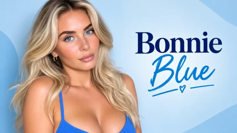 Bonnie Blue posing in a blue top with long blonde wavy hair